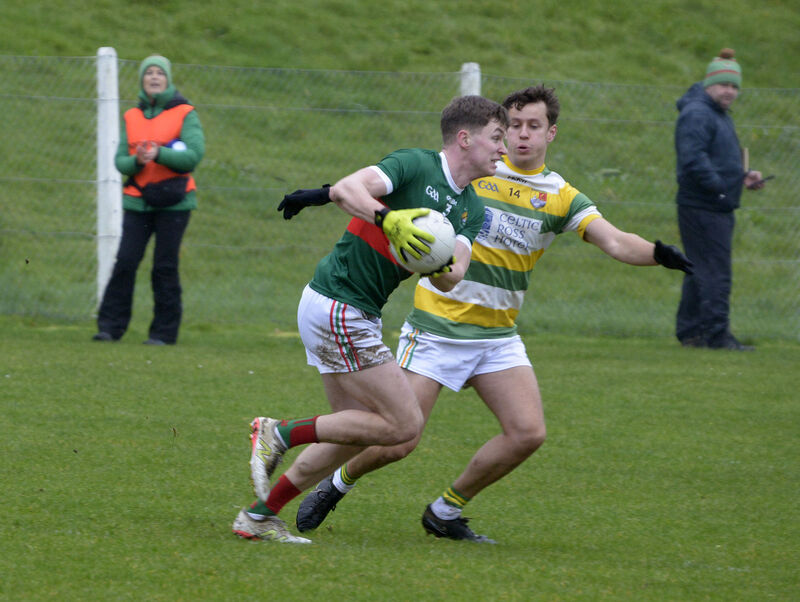 Carbery Rangers' Conor Twomey tackling Clonakilty's Dan Peet. Picture: Denis Boyle