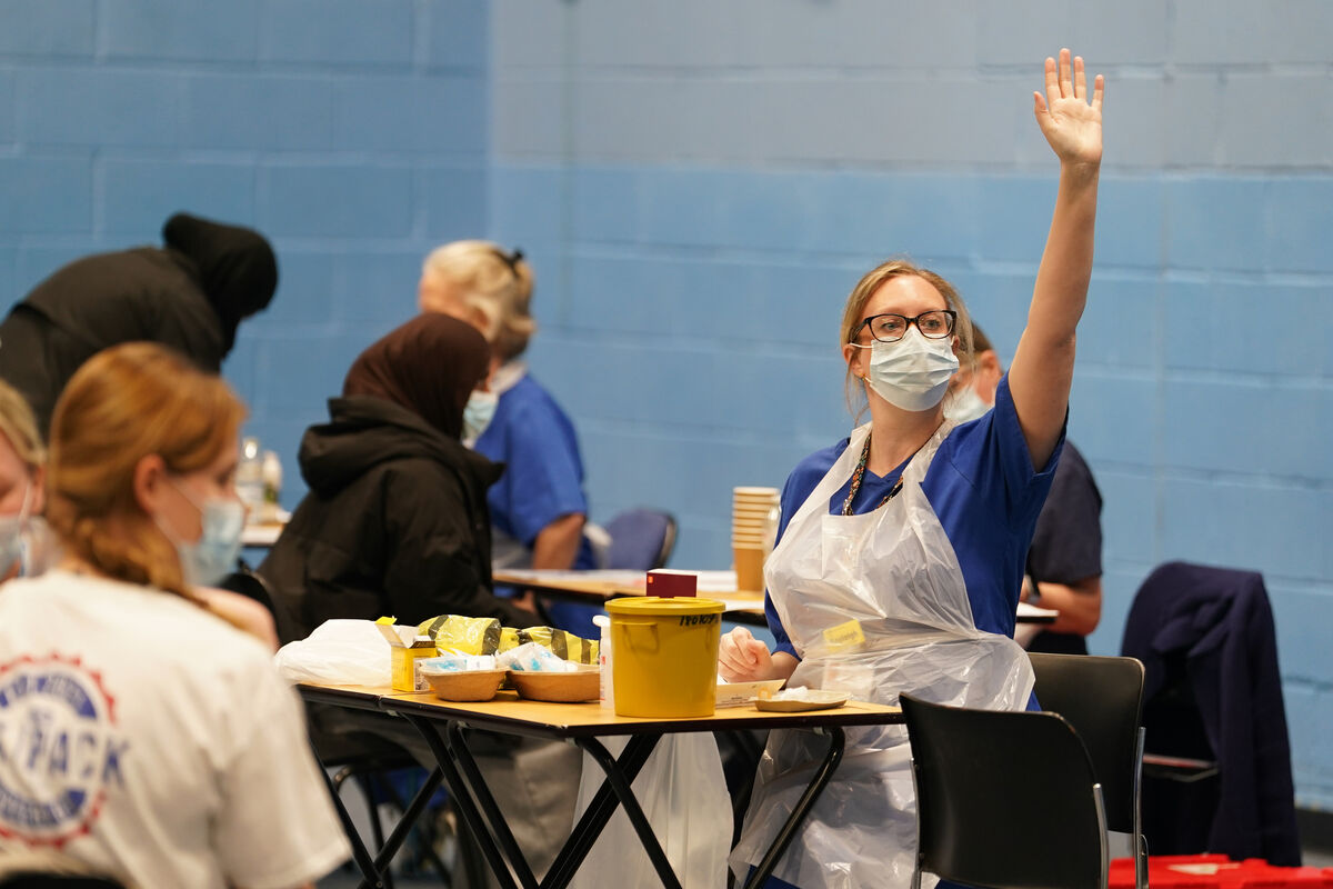 A medical staff member calls for another patient in the sports hall at the University of Kent campus in Canterbury. The number of cases of meningitis being investigated by the UKHSA in Kent has risen to 27. Picture: Gareth Fuller/PA