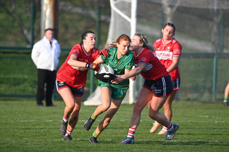  Leah Hallahan and Katie Quirke try to prevent a clearance by Meath defender Karla Kealy. Picture: Larry Cummins