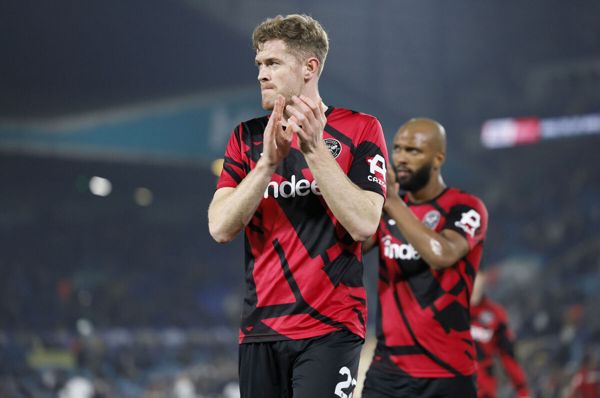 Brentford's Nathan Collins (left) applauds the fans during the warm-up ahead of the Premier League match at Elland Road. Pic: Richard Sellers/PA Wire.
