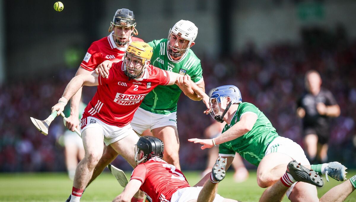 Cork's Niall O'Leary and Eoin Downey challenge for the ball with Aaron Gillane and Shane O'Brien of Limerick. Pic: Tom Maher/Inpho
