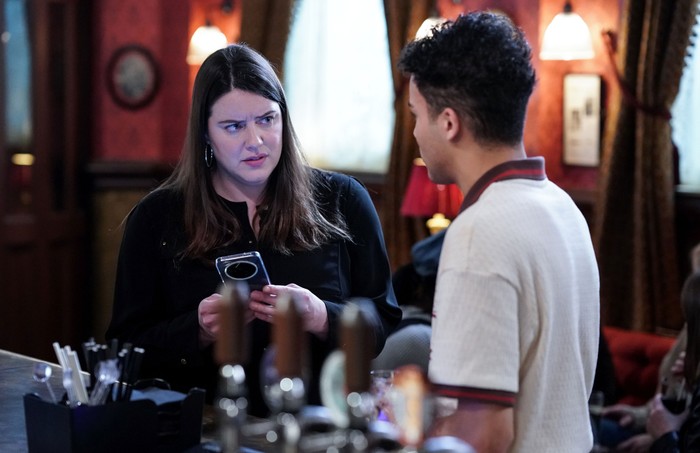 Josh chats to Zoe in The Queen Vic in a scene from EastEnders