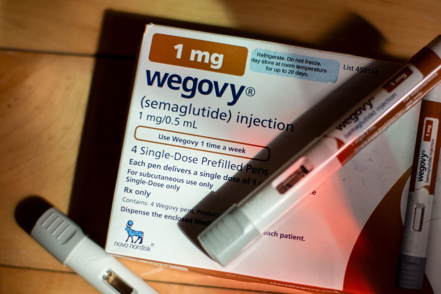 Wegovy injection pens arranged in Waterbury, Vermont, US, on Monday, April 28, 2025. Novo Nordisk A/S is following in rival Eli Lilly & Co.'s footsteps by selling its hit weight-loss drug Wegovy directly to US patients at a discount.