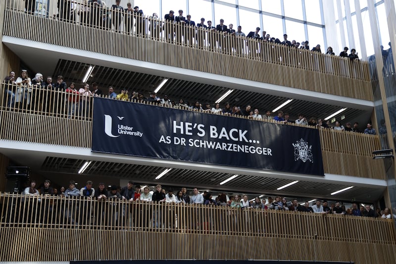 Students watch the honorary graduation of Arnold Schwarzenegger at Ulster University Belfast. Photograph: Nick Bradshaw 