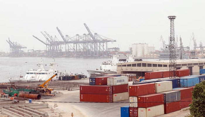 Shipping containers are stacked at the Karachi port area in Karachi, Pakistan, on July 31, 2025. — Reuters