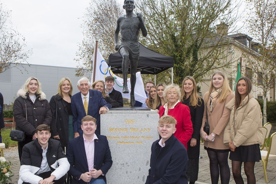 Ronnie Delany with his wife, Joan, and his grandchildren at the official unveiling in Arklow of a statue in his honour in 2021. Photo: Michael Kelly