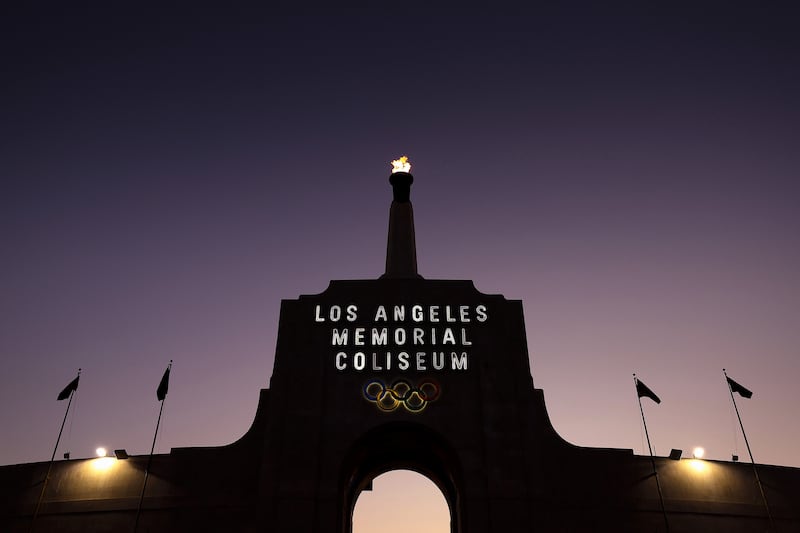 A general view of a flame atop a lit Olympic torch at the peristyle of the Los Angeles Memorial Coliseum on August 30, 2025 in Los Angeles, California. Photograph: Luke Hales/Getty Images