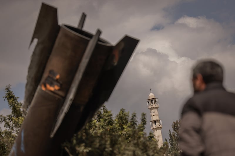 A fragment of a missile that landed in an orchard near the Palestinian village of Hares in the West Bank, on Tuesday. Photograph: The New York Times