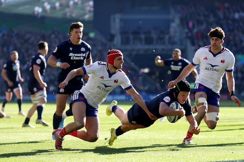 Darcy Graham of Scotland scores his team's first try during the Six Nations match between Scotland and France at Murrayfield on March 7th. Photograph: Stu Forster/Getty Images