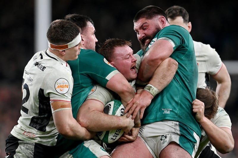 Dewi Lake of Wales is tackled by Tom O'Toole and Rónan Kelleher of Ireland. Photograph: Charles McQuillan/Getty Images