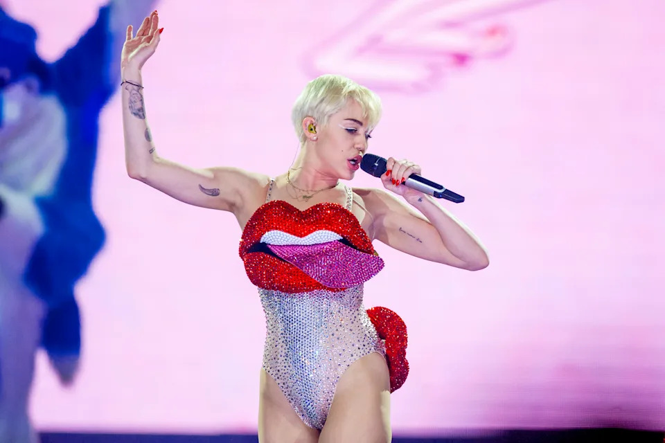 Miley Cyrus performing in the U.K. in 2014