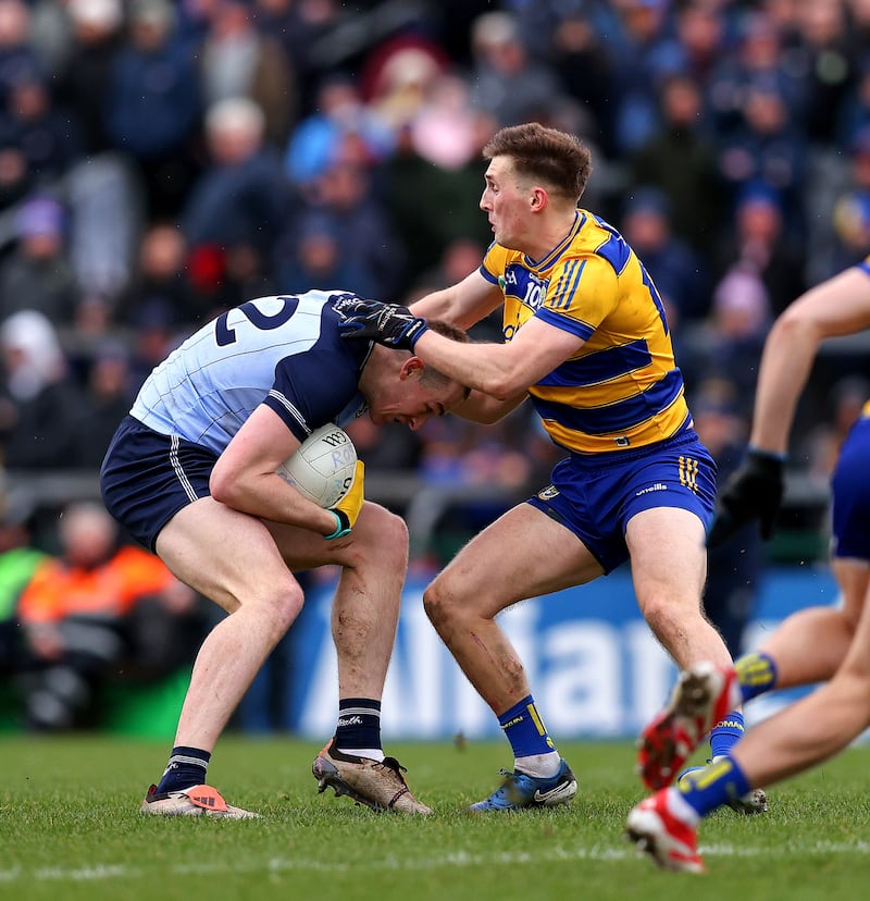 Dublin's Peadar Ó Cofaigh Byrne tackled by Dylan Ruane of Roscommon in their Division 1 clash. Photograph: Tom O’Hanlon/Inpho