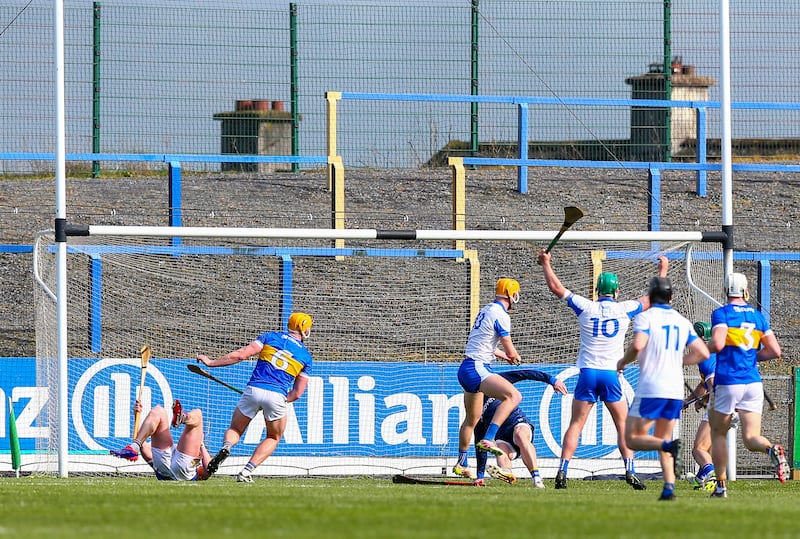 Sean Walsh hits the back of the net for Waterford in their NHL Division 1A clash with Tipperary. Photograph: INPHO
