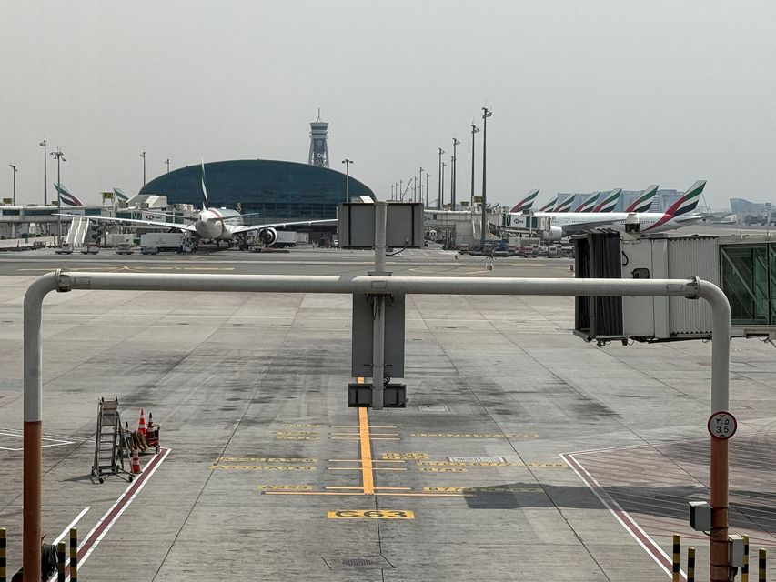 Emirates airplanes at Dubai International Airport amid the US-Israeli conflict with Iran in Dubai, United Arab Emirates. Photo: REUTERS/Stringer