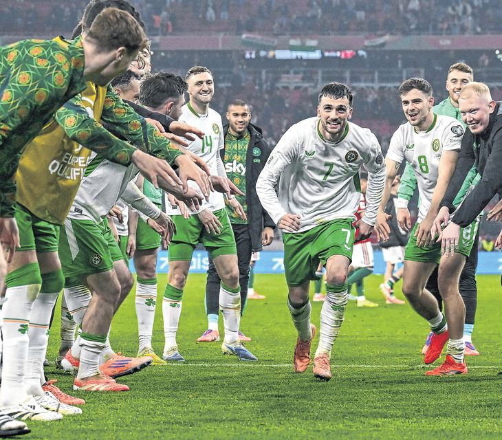 Troy Parrott celebrates his hat-trick against Hungary with team-mates in Budapest - much will rest on his shoulders. Photo: Stephen McCarthy/Sportsfile