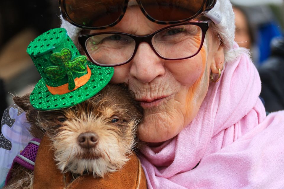 Kay Plunkett with her dog Rosie, enjoying  the St Patrick's Festival Parade, in Killarney town on Tuesday, organised by Killarney Chamber of Tourism and Commerce. Photo by Valerie O'Sullivan. 