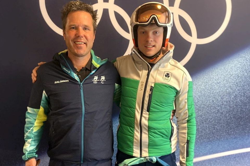 Paul Wilson (left) with Irish alpine skier Cormac Comerford at the 2026 Winter Olympics.
