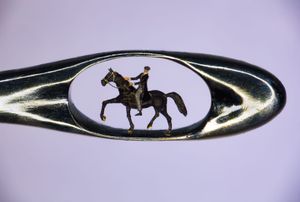 The tiny Peaky Blinders figure in the eye of a needle