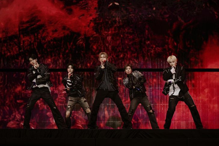 Members of K-pop boy band TOMORROW X TOGETHER perform during “2026 TXT MOA CON” at KSPO DOME in Olympic Park in Seoul’s Songpa District, March 1. Courtesy of BigHit Music