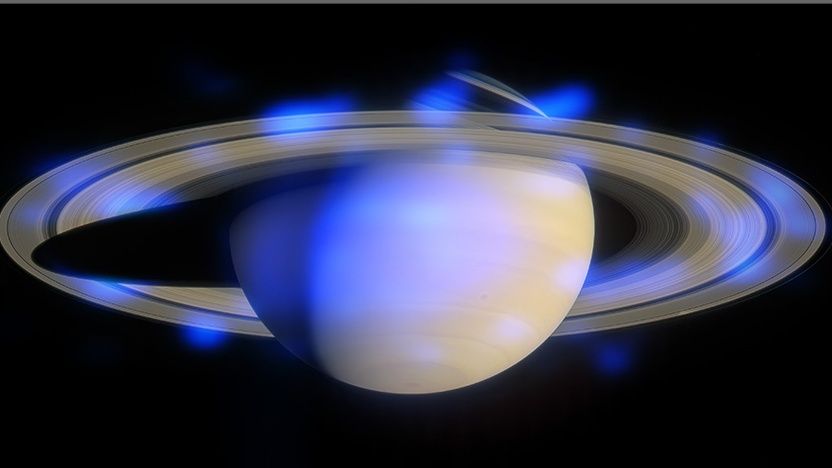 A view of Jupiter with blue blobs all around it.