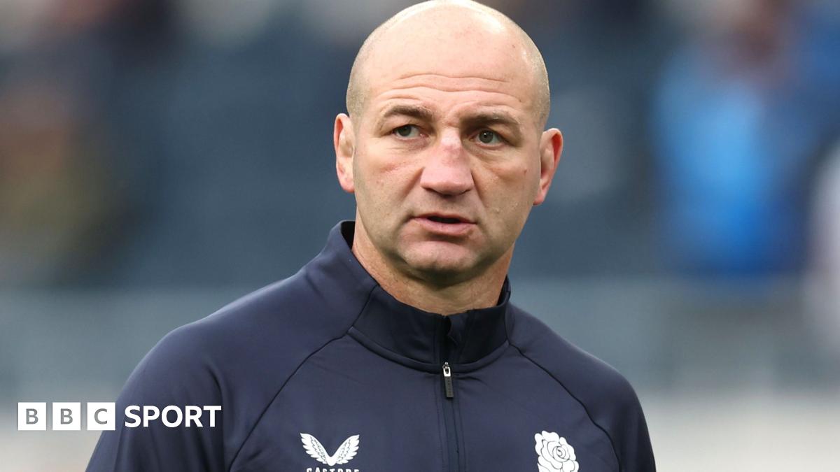 England players in a huddle during training