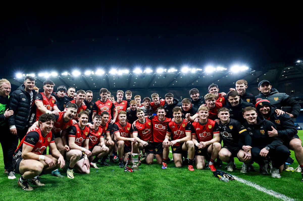 The Down team celebrate with the cup after their Division Three final win over Wexford in Croke Park on Saturday night 