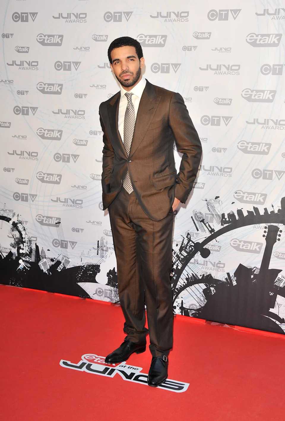 TORONTO, ON - MARCH 27:  Host/singer Drake poses on the red carpet at the 2011 Juno Awards at the Air Canada Centre on March 27, 2011 in Toronto, Canada.  (Photo by George Pimentel/WireImage)