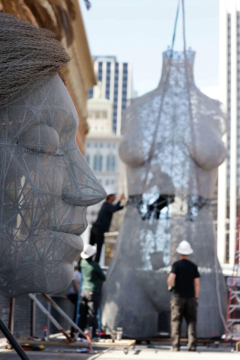 Marco Cochrane's sculpture "R-Evolution" being installed at Justin Herman Plaza. (Lea Suzuki/S.F. Chronicle)
