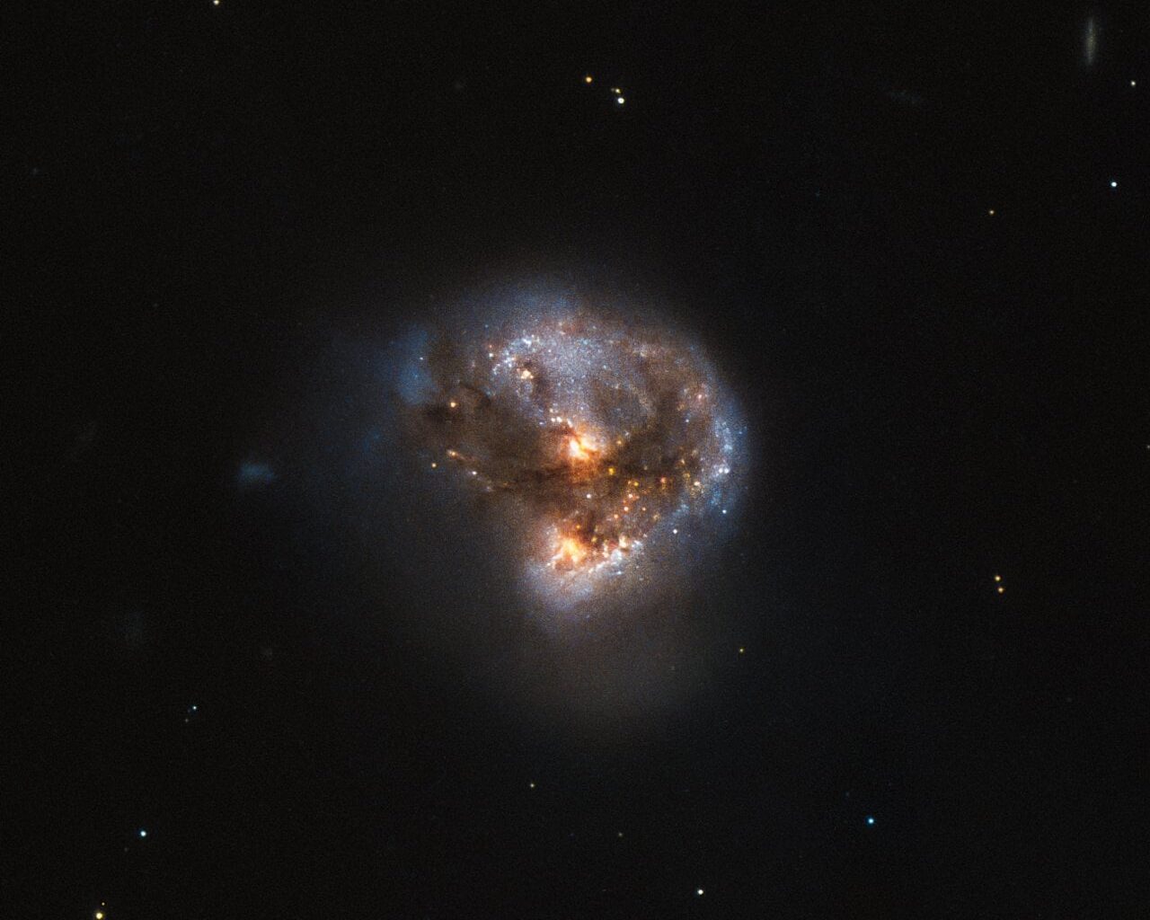 A megamaser acts as an astronomical laser that beams out microwave emission rather than visible light. Credit: ESA/Hubble