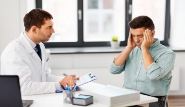 Adult patient with cluster headache symptoms speaking with a clinician about topiramate prophylaxis