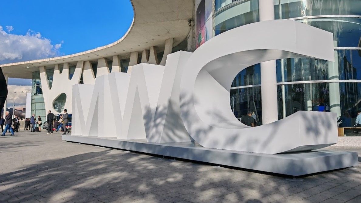 The "MWC" sign outside of a building