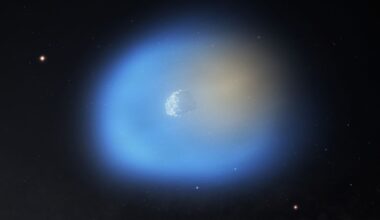 illustration of a rocky whitish-gray comet, surrounded by a bluish, transparent cloud of gases, in deep space