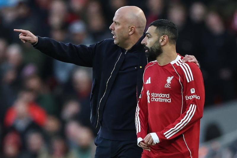 Liverpool manager Arne Slot substitutes in striker Mo Salah during the second half against Spurs.  Photograph: Darren Staples/AFP via Getty Images