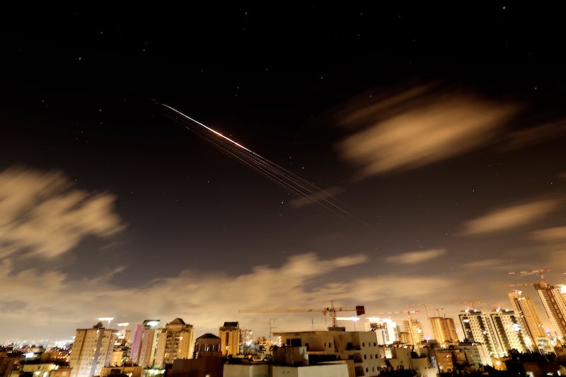 Rocket trails are seen in the sky amid a fresh barrage of Iranian missile attacks above the Israeli coastal city of Netanya on Friday. Photograph: Jack Guez/AFP via Getty Images