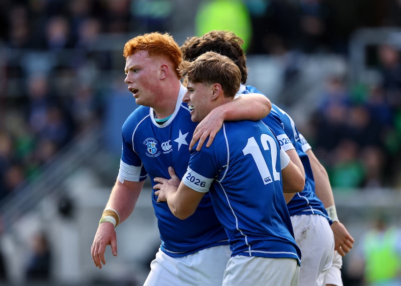 St Mary's Daniel Tourish celebrates with Joseph Christle after scoring his side's second try. Photograph: Ben Brady/Inpho