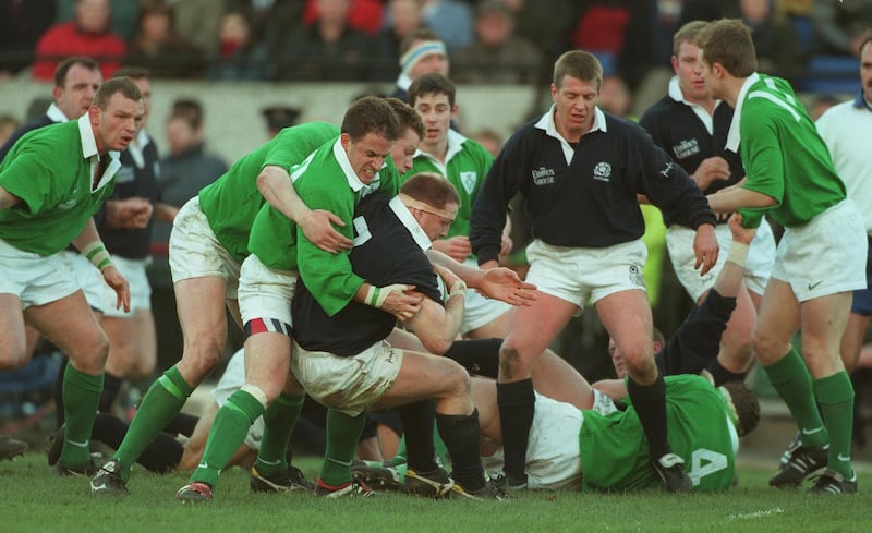 Matthew Stewart is tackled by Ireland's David Humphreys during a routine win for Scotland in Dublin in 1998. Photograph: Inpho