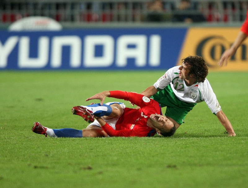 Stephen Hunt tackles Jan Polak of the Czech Republic during the European Championships qualifier in Prague in September 2007. Photograph: Donall Farmer/INPHO