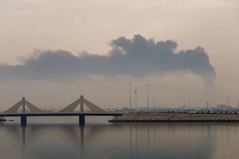 A plume of smoke rises after a reported Iranian strike on fuel tanks in Muharraq on Thursday. Photograph: Fadhel Madhan/AFP via Getty Images