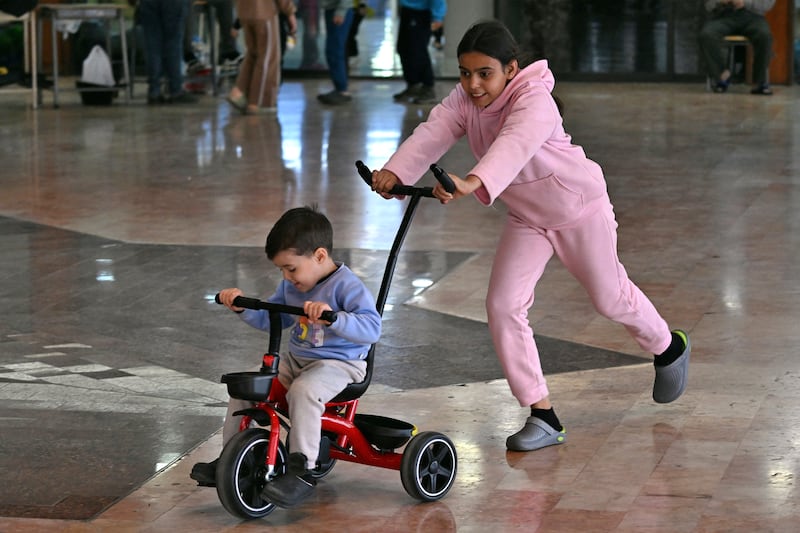 Children play inside a school transformed into a shelter for displaced people in the town to Dekwaneh, north of Beirut on Thursday. Photograph: Joseph Eid/ AFP via Getty Images