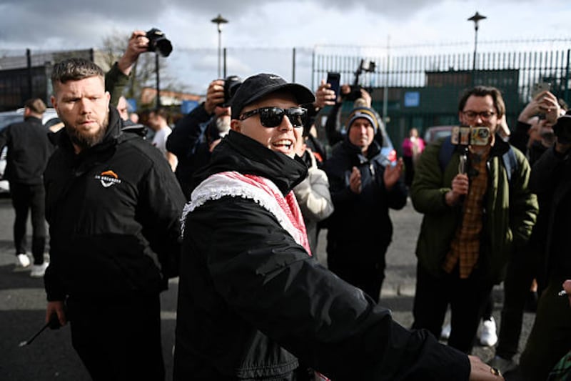 Liam Óg Ó hAnnaidh, aka Mo Chara, of the band Kneecap speaks to well-wishers. Photo by Charles McQuillan/Getty Images