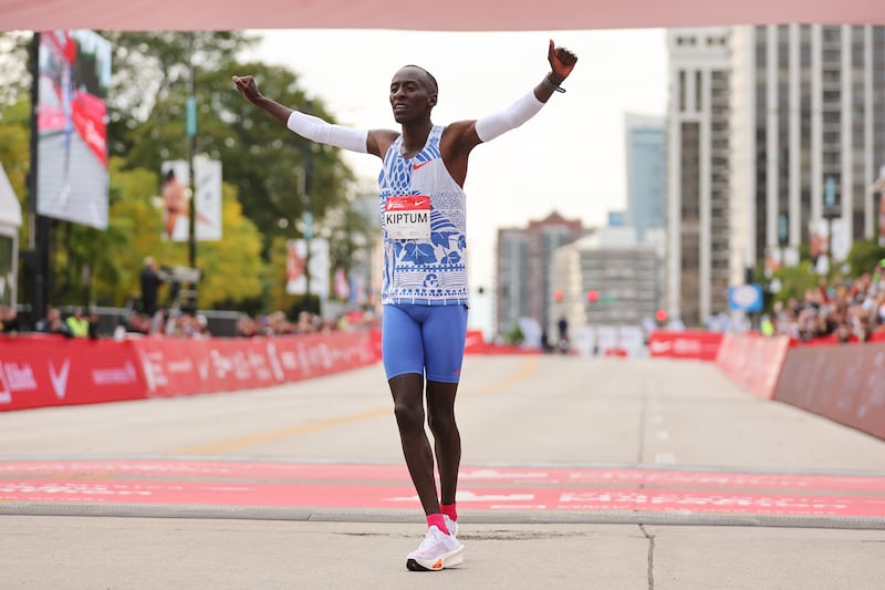 Kelvin Kiptum of Kenya celebrates after winning the 2023 Chicago marathon professional men's division and setting a world record time of 2:00.35. Photograph: Michael Reaves/Getty Images