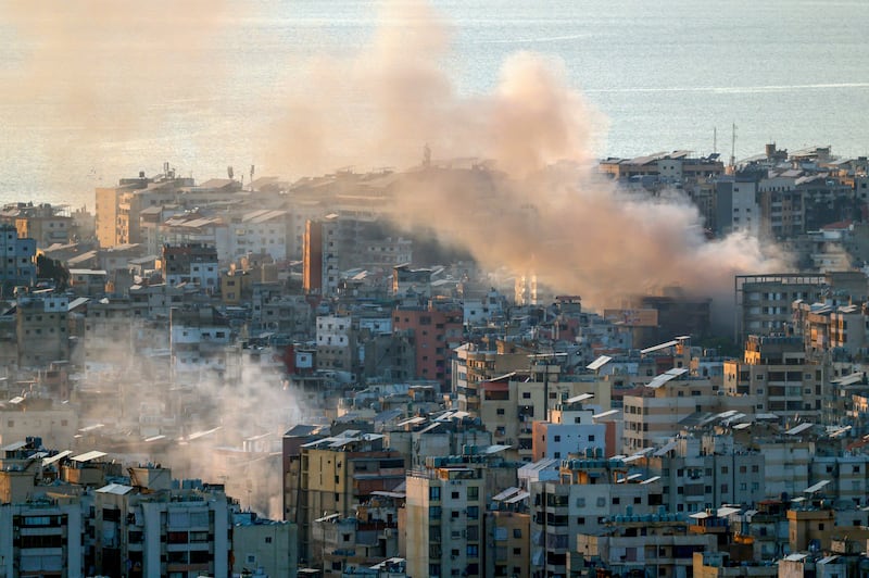 Smoke rises from destroyed buildings after Israeli strikes in the southern suburbs of Beirut, Lebanon. Photograph: Wael Hamzeh/EPA
