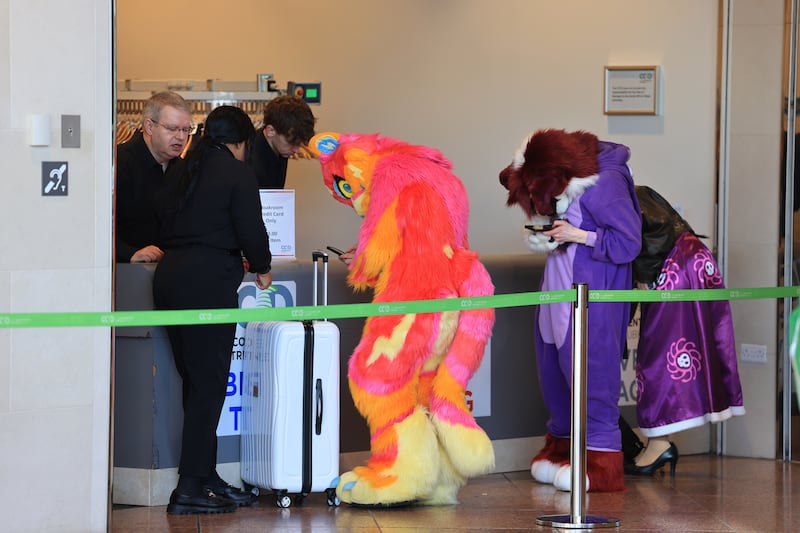 Visitors check in their bags at Dublin Comic Con 2026 at the Convention Centre Dublin on Sunday. Photograph: Dara Mac Dónaill