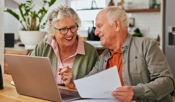Couple sorting finances Couple sorting finances