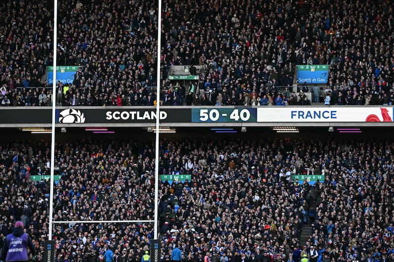 The scoreboard displays the final 50-40 scoreline at Murrayfield. Photograph:  Paul Ellis/AFP via Getty Images