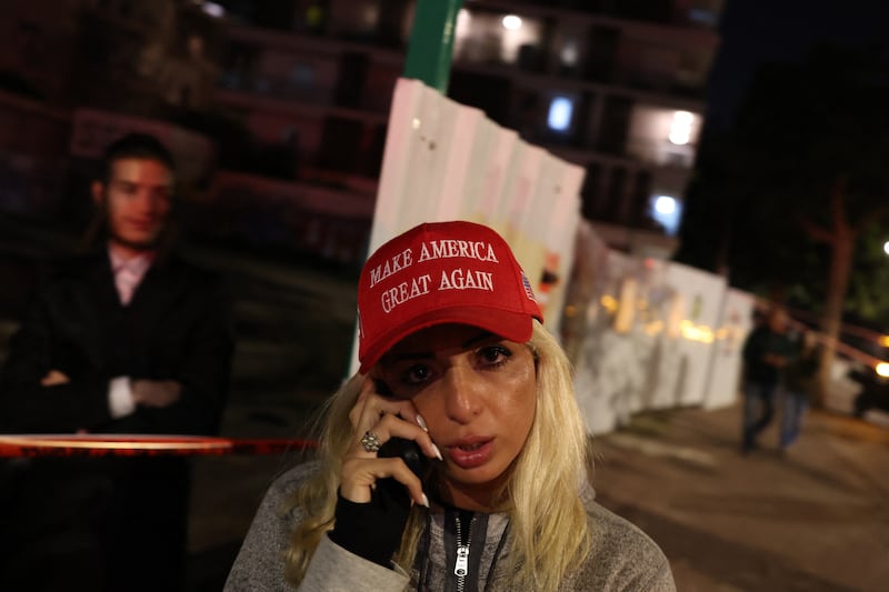 A woman makes a phone call at the site of a strike in Tel Aviv on March 28th, 2026. As the Israeli army reported missiles fired by Iran, sirens sounded in Jerusalem and explosions were heard in Jericho, in the occupied West Bank, according to journalists. Photograph: Ilia YEFIMOVICH/AFP via Getty Images