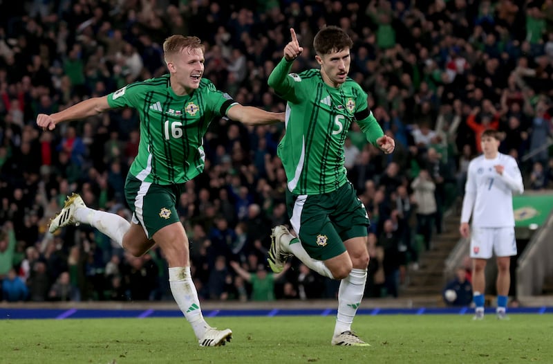 Trai Hume (right) celebrates scoring Northern Ireland's second goal during the Uefa World Cup qualifier against Slovakia in October. Photograph: Liam McBurney/PA