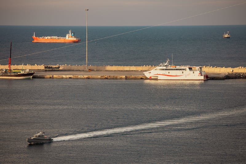 A police speed boat patrols the port as oil tankers and high speed crafts sit anchored at Muscat Anchorage near the Strait of Hormuz on March 30th, 2026 in Muscat, Oman. Photograph: Elke Scholiers/Getty Images