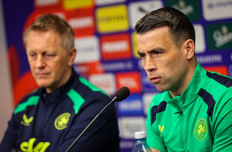 Republic of Ireland head coach Heimir Hallgrímsson and Seamus Coleman at the press conference before the game. Photograph: Ryan Byrne/Inpho