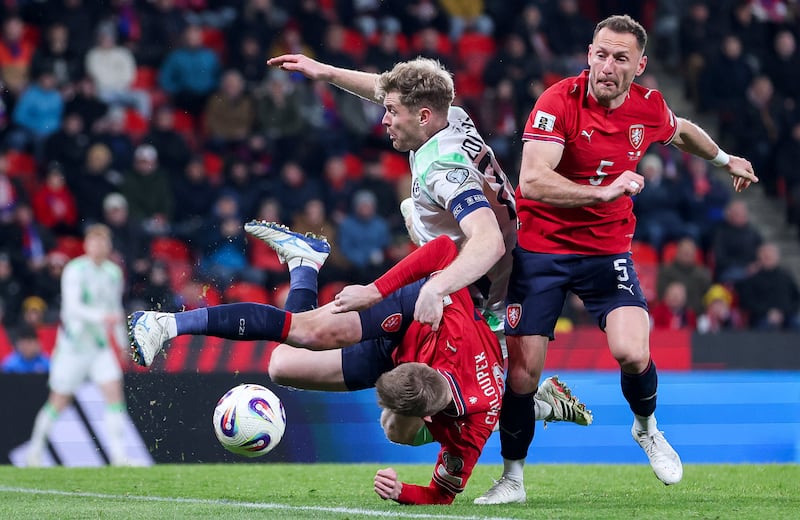Ireland's Nathan Collins with Štěpán Chaloupek of the Czech Republic at the Fortuna Arena, Prague. Photograph: Ryan Byrne/Inpho